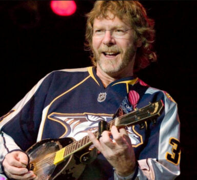 Hire Sam Bush - booking Sam Bush information.