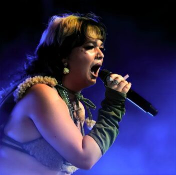 Hire Lola Young. Booking Lola Young information.